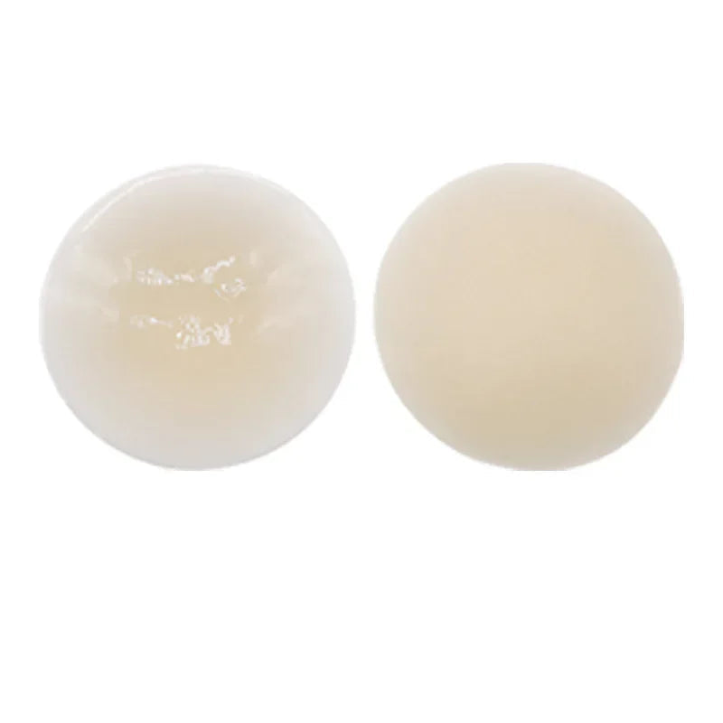 Two beige-colored balls on a white background with text '浅肤色' below them.