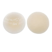 Two beige-colored balls on a white background with text '浅肤色' below them.